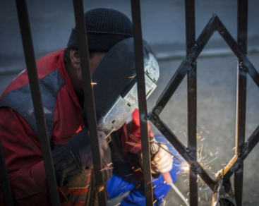 Mobile welding in Cheyenne, WY welding residential fence.