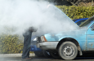 over heated engine smoking and mobile mechanic was diagnosing problem in Cheyenne, WY