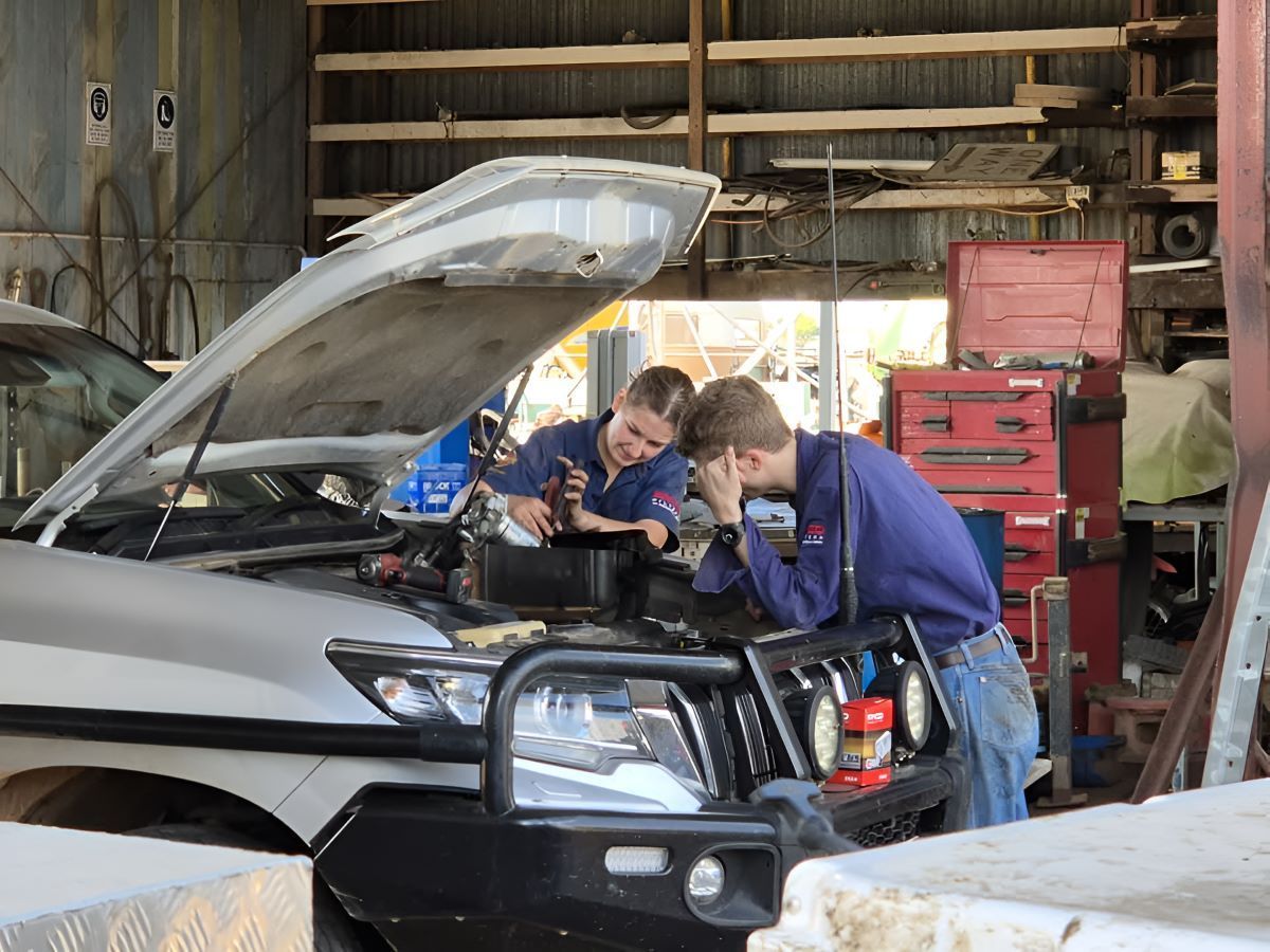 Men and Women Are Working on a Car — SMK Rural & Mechanical Pty Ltd in Rockhampton City, QLD