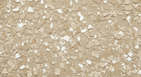 Beige speckled textured surface with scattered light-colored flakes