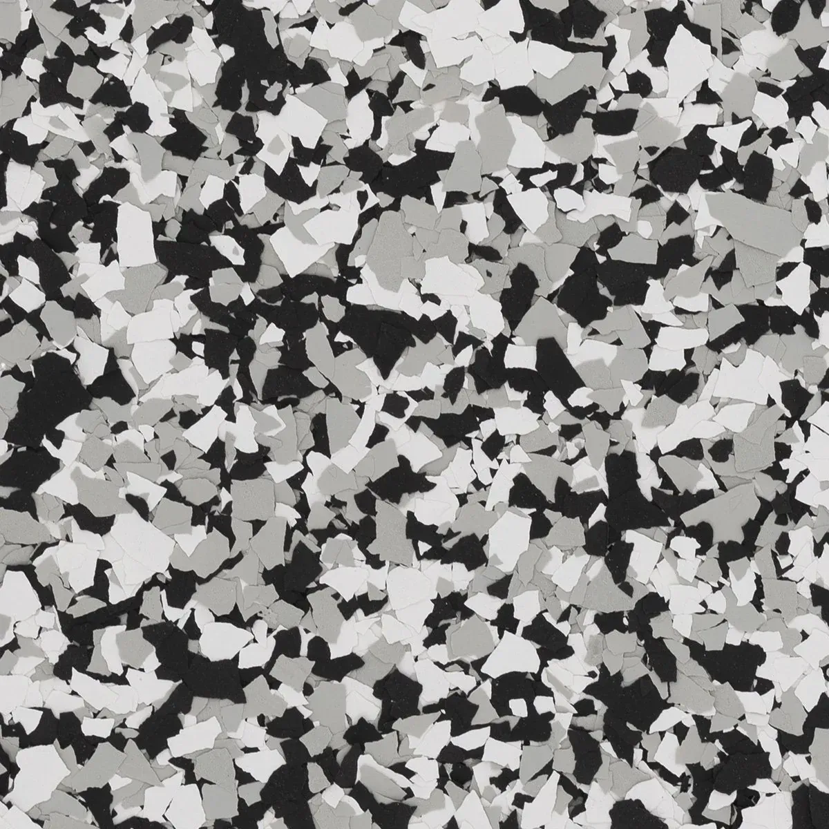Abstract black, white, and gray camouflage-like pattern of scattered shapes.