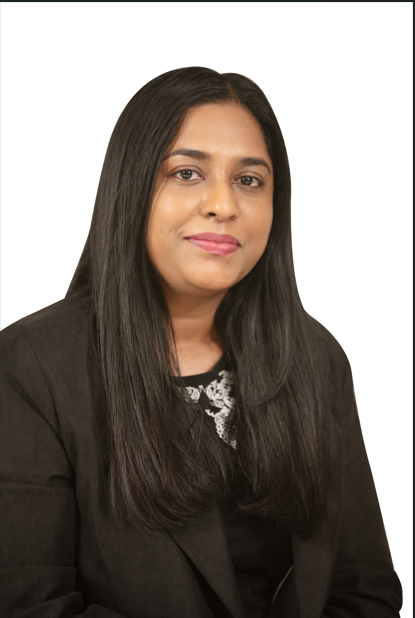 A woman with long black hair is wearing a black jacket