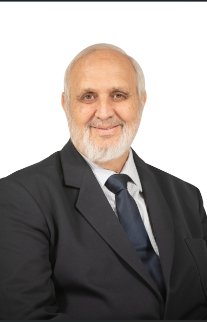 A man with a beard wearing a suit and tie