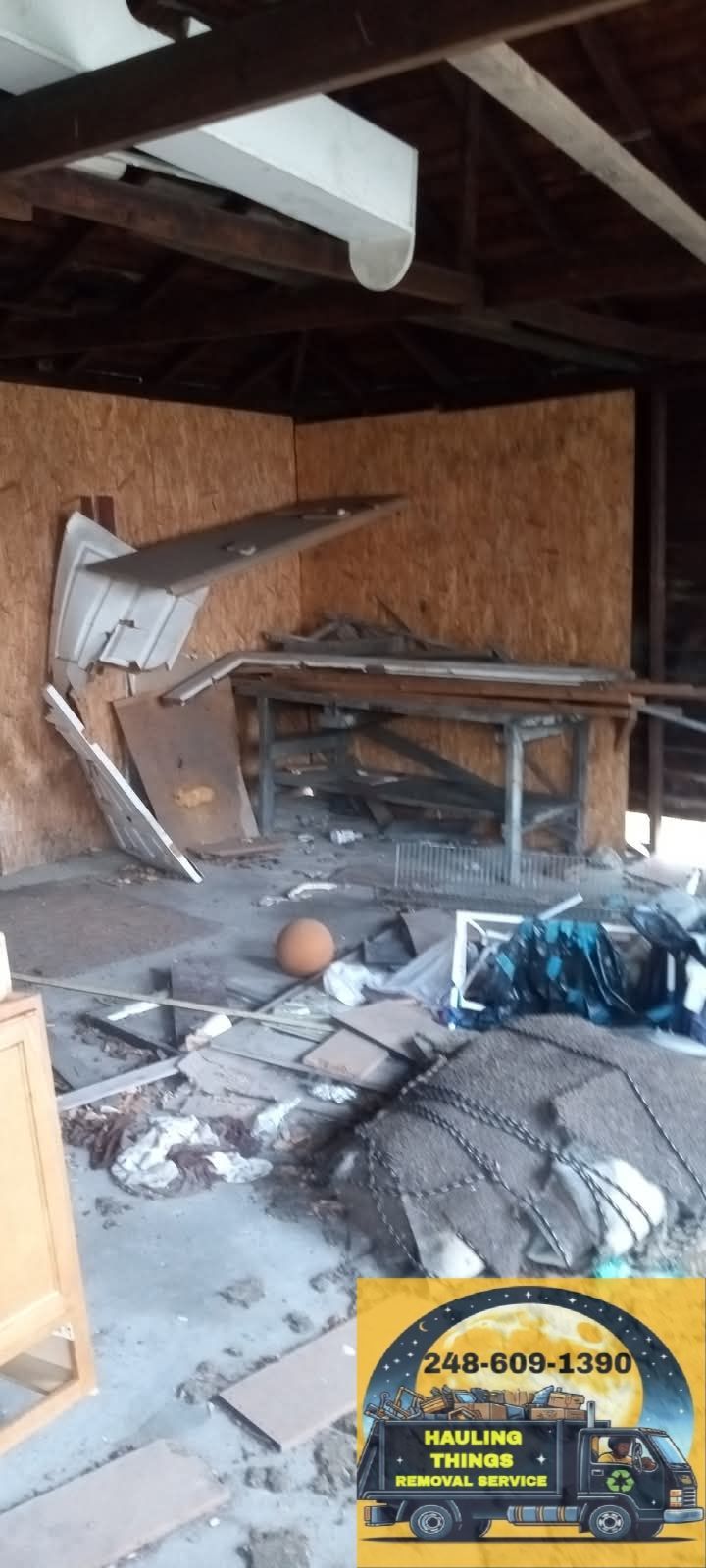 A room with a lot of junk in it and a truck in the background.