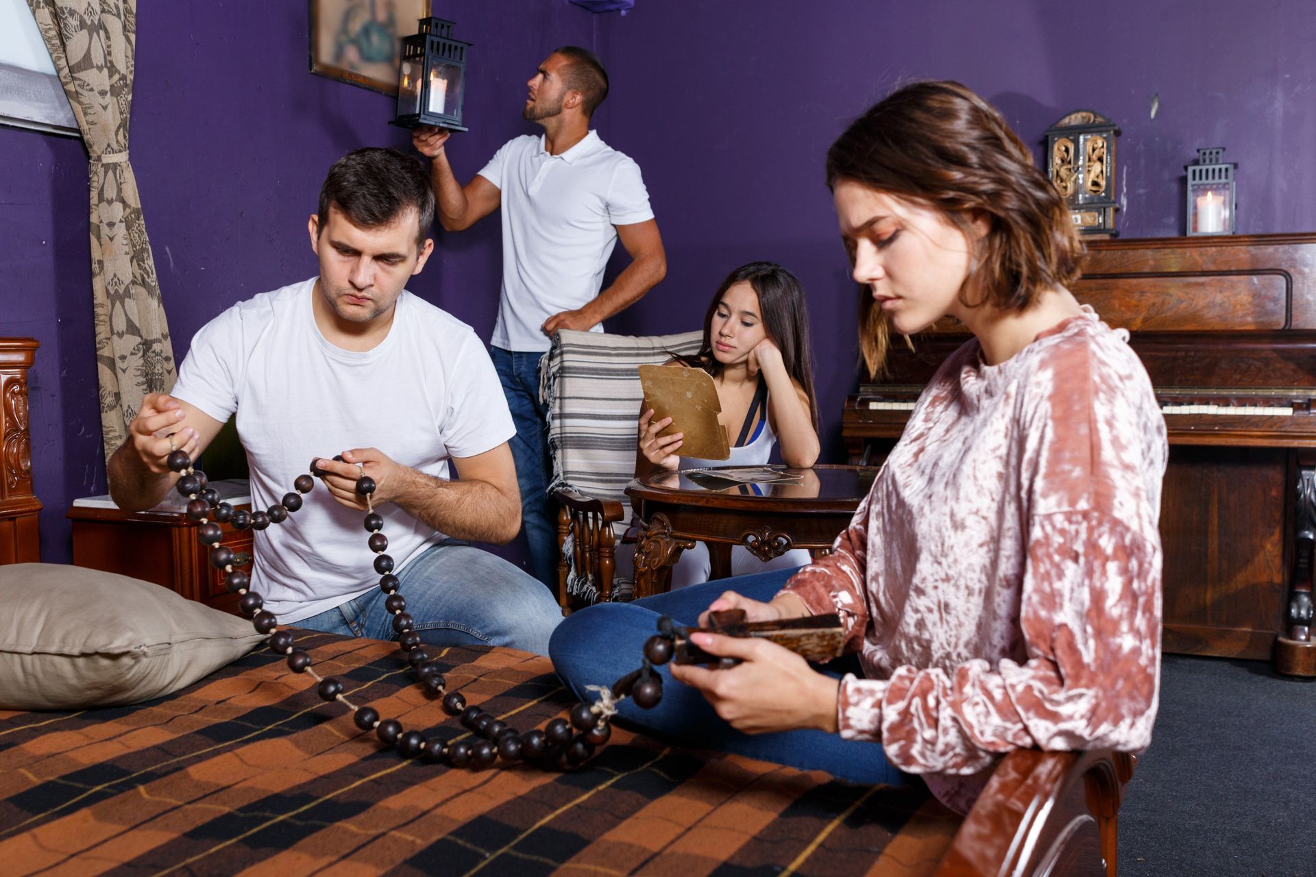 A group of people are playing a game in a room.