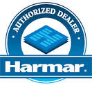 A blue and white logo for a harmar authorized dealer.