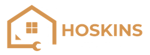 A logo for hoskins with a house and a wrench.