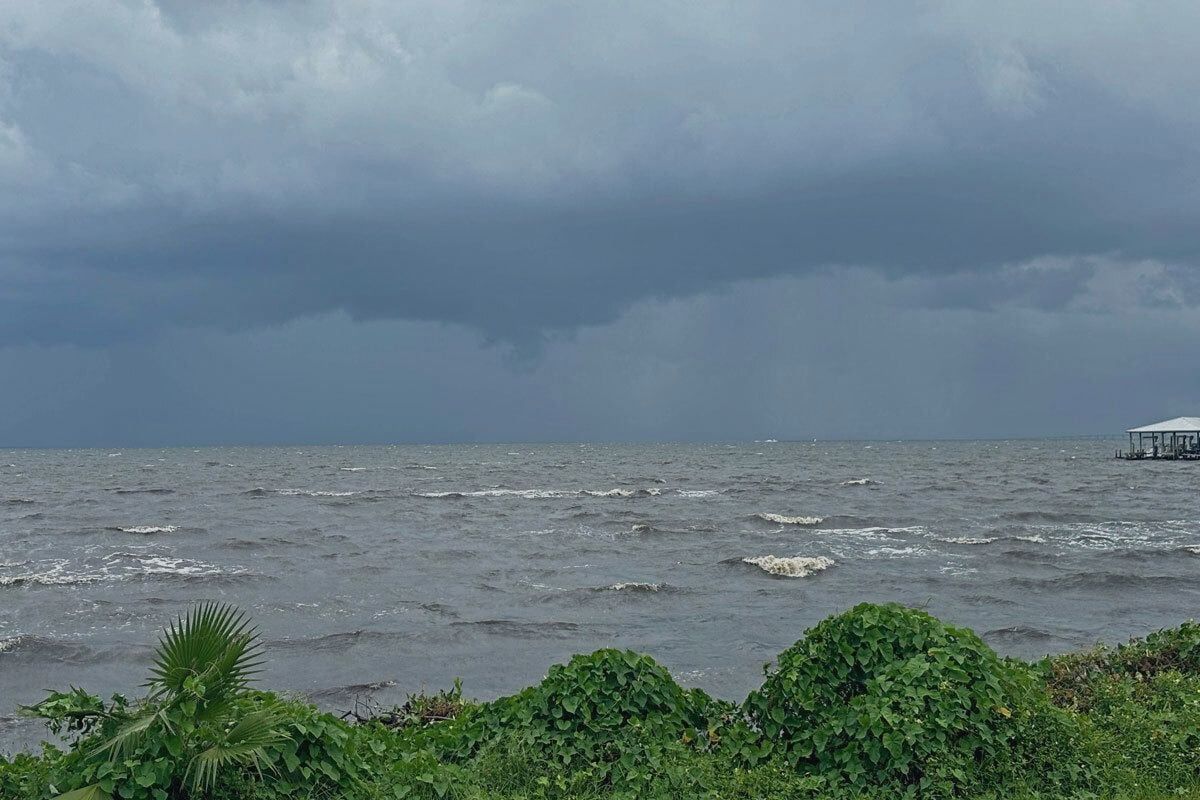 Photo of the Indian River with dark clouds on a stormy day.