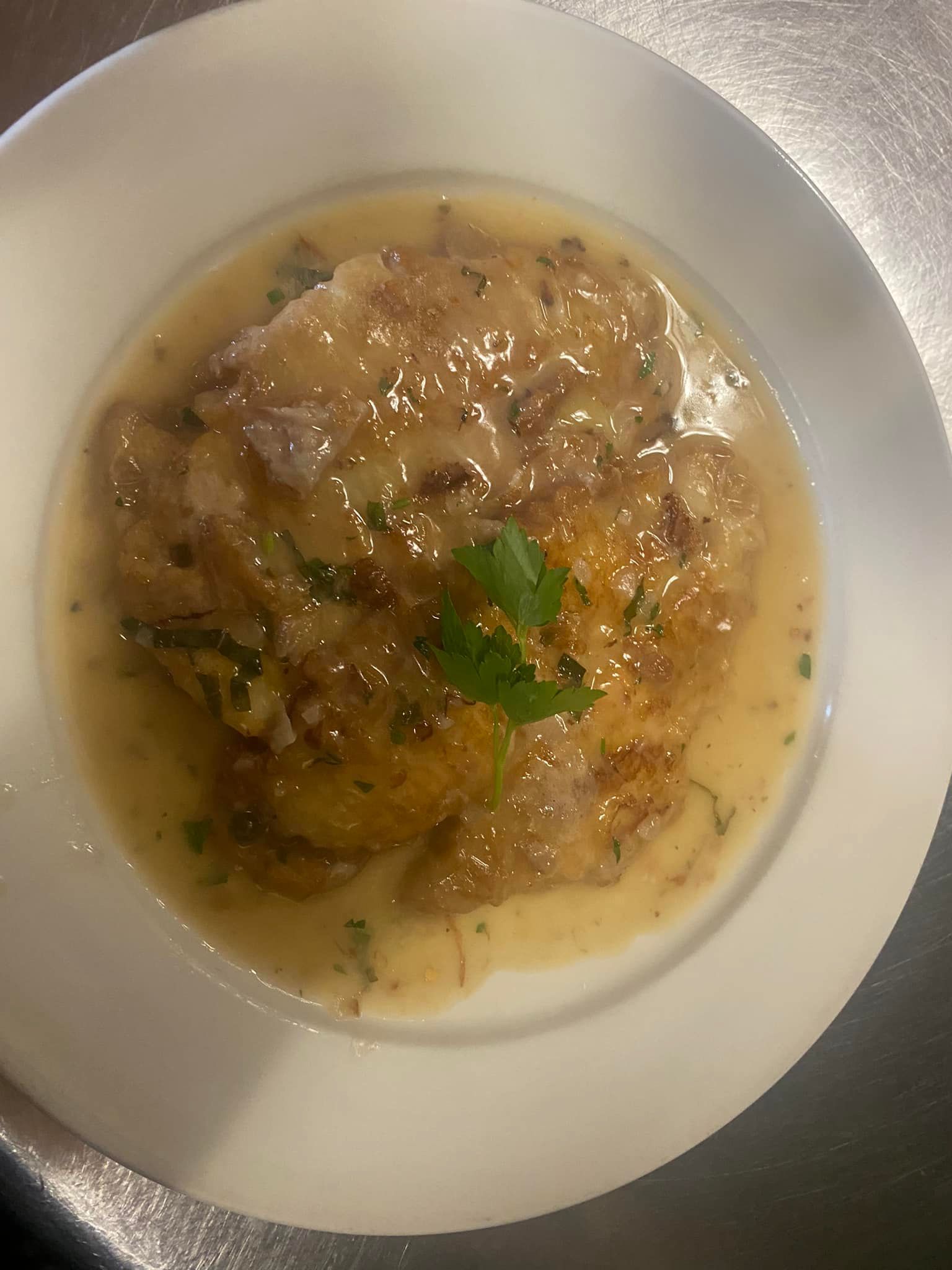 A close up of a plate of food on a table.