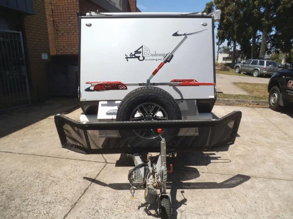 A White Trailer With Sway Control Attached To It — Lake Macquarie Caravan Repairs In Cardiff, NSW