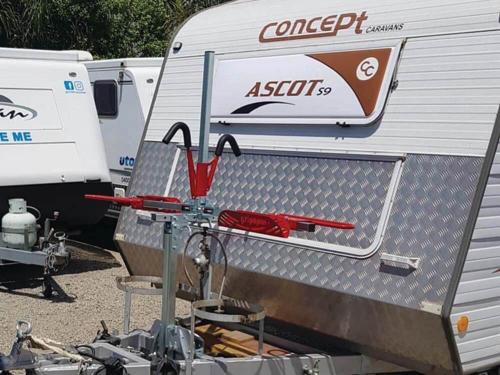 A Trailer With A Bike Rack Attached To It — Lake Macquarie Caravan Repairs In Cardiff, NSW