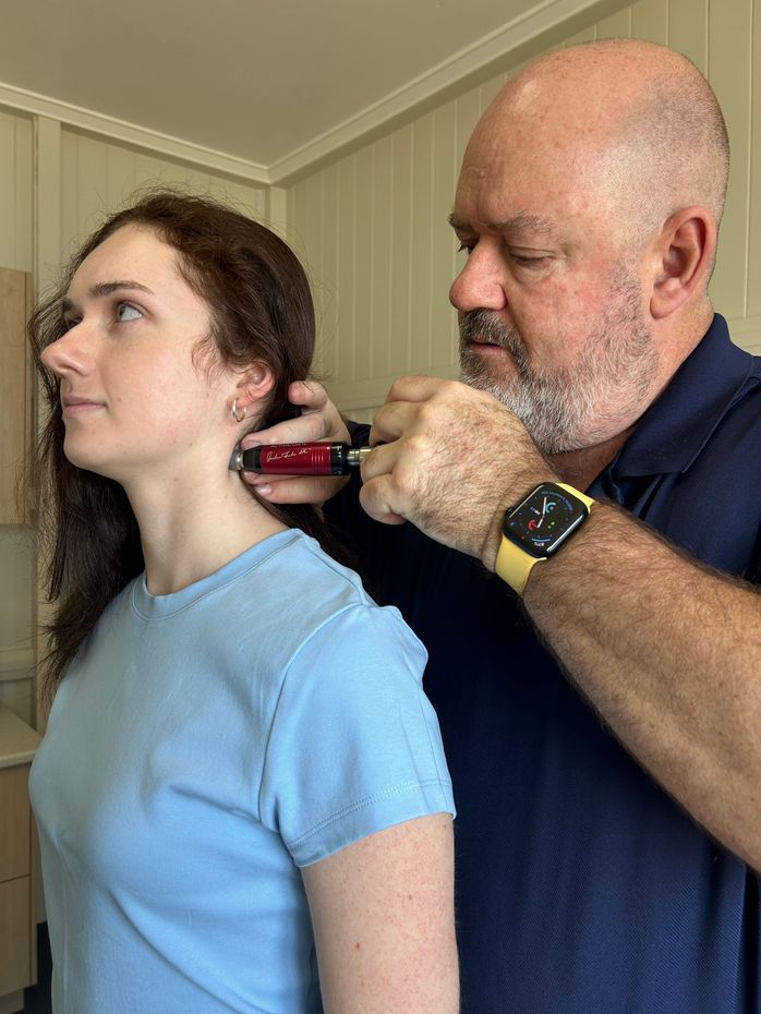 Doctor Doing Neck Adjustment — Chiropractor