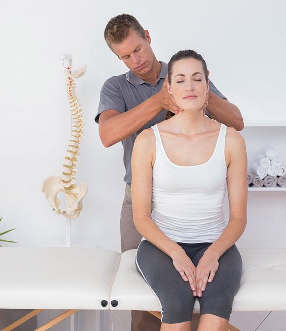 Doctor Doing Neck Adjustment — Chiropractor
