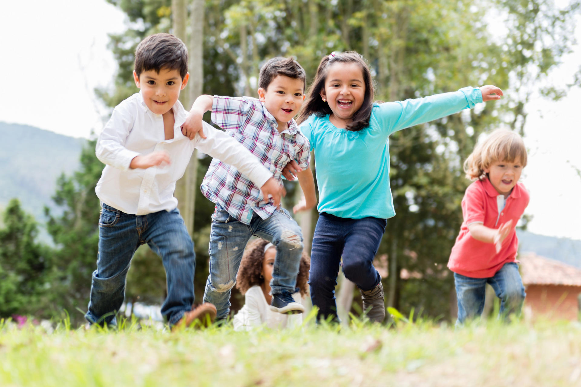 Kids enjoying outdoor play, highlighting that school and sports with asthma medication support healthy, active lifestyles.