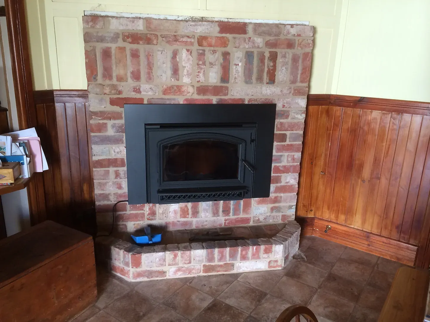 brick mantle with fireplace built in