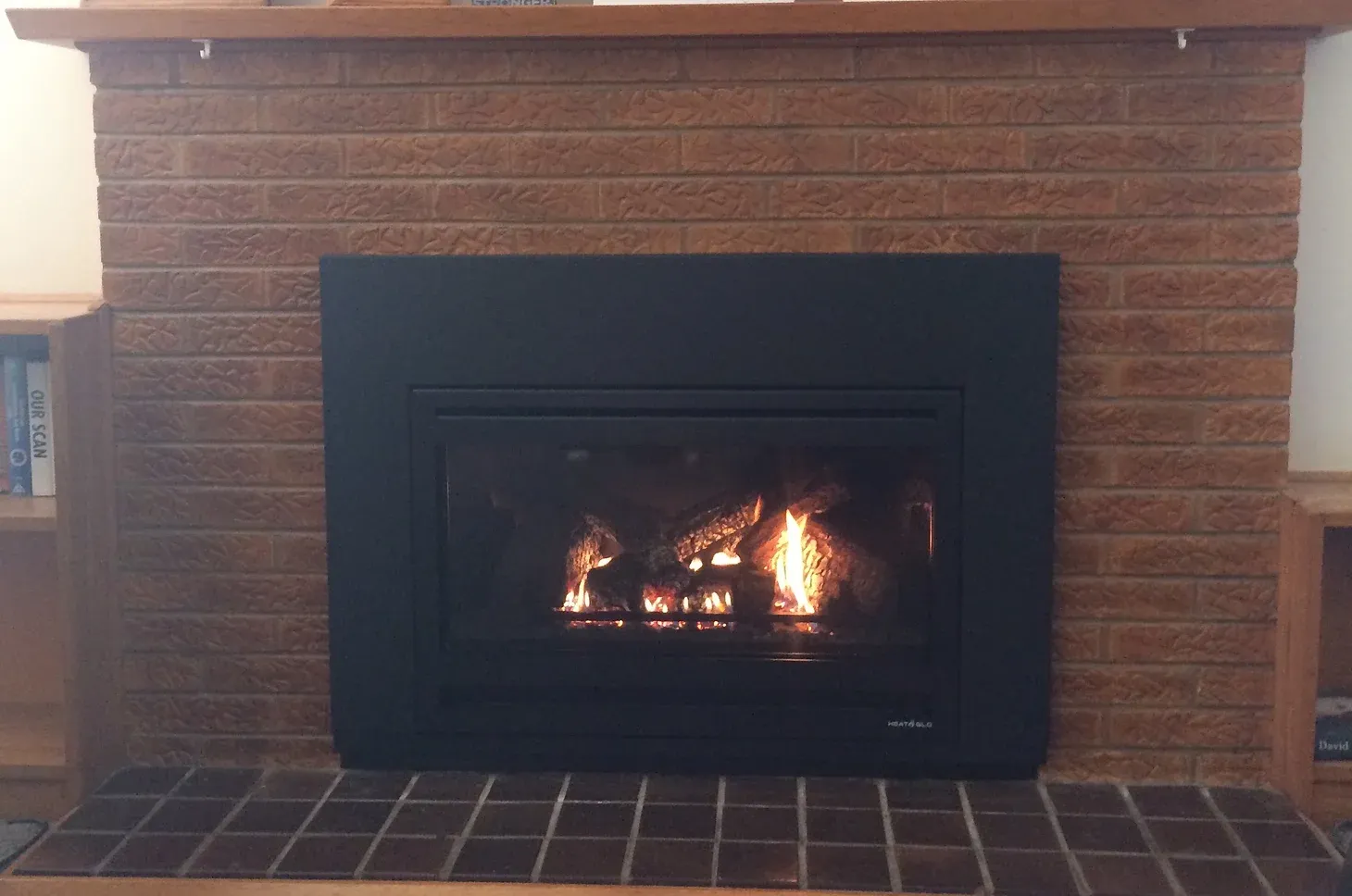 fireplace built into brick wall installed by dwr services