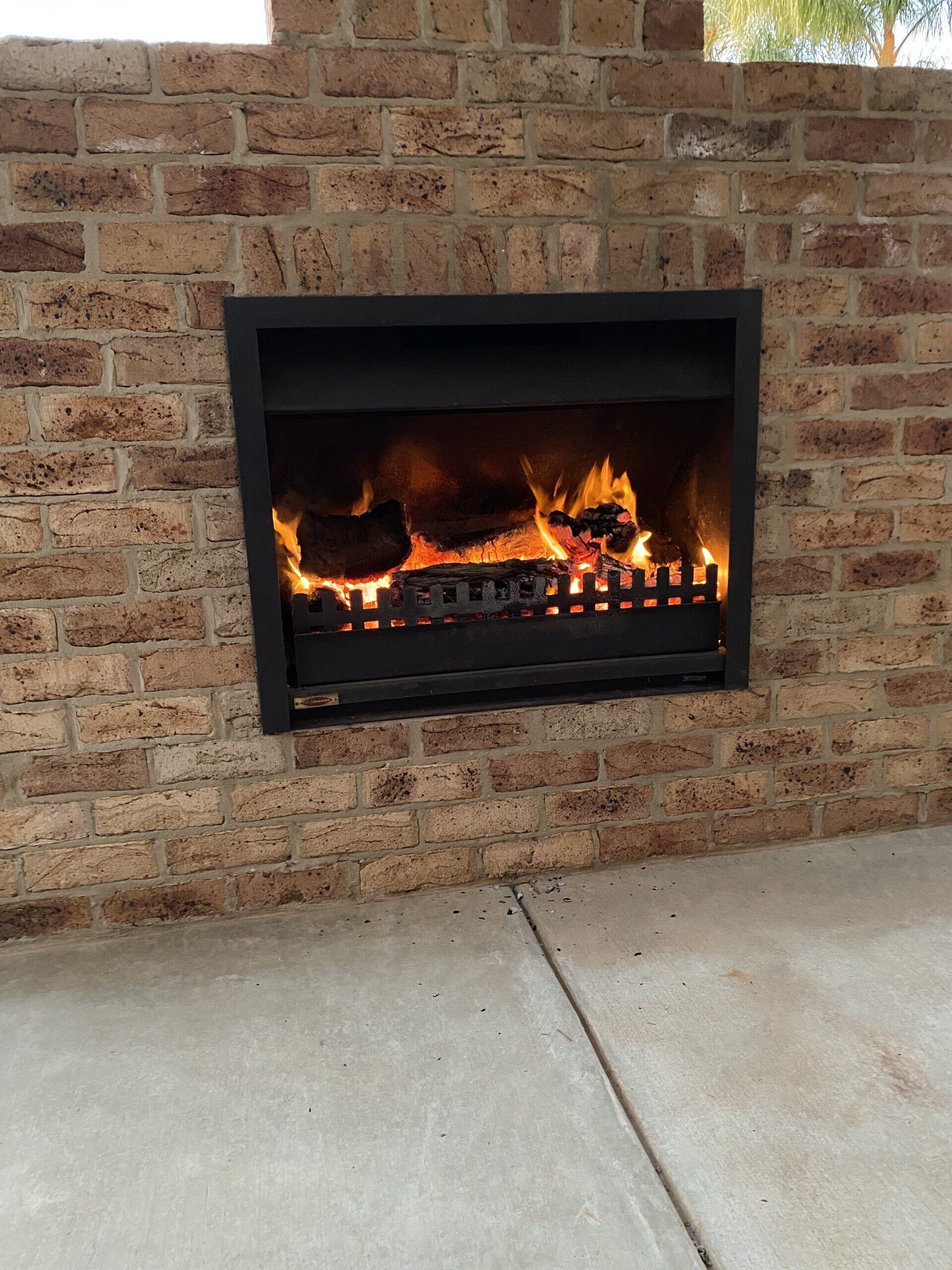 fireplace installed by dwr services into brick wall 