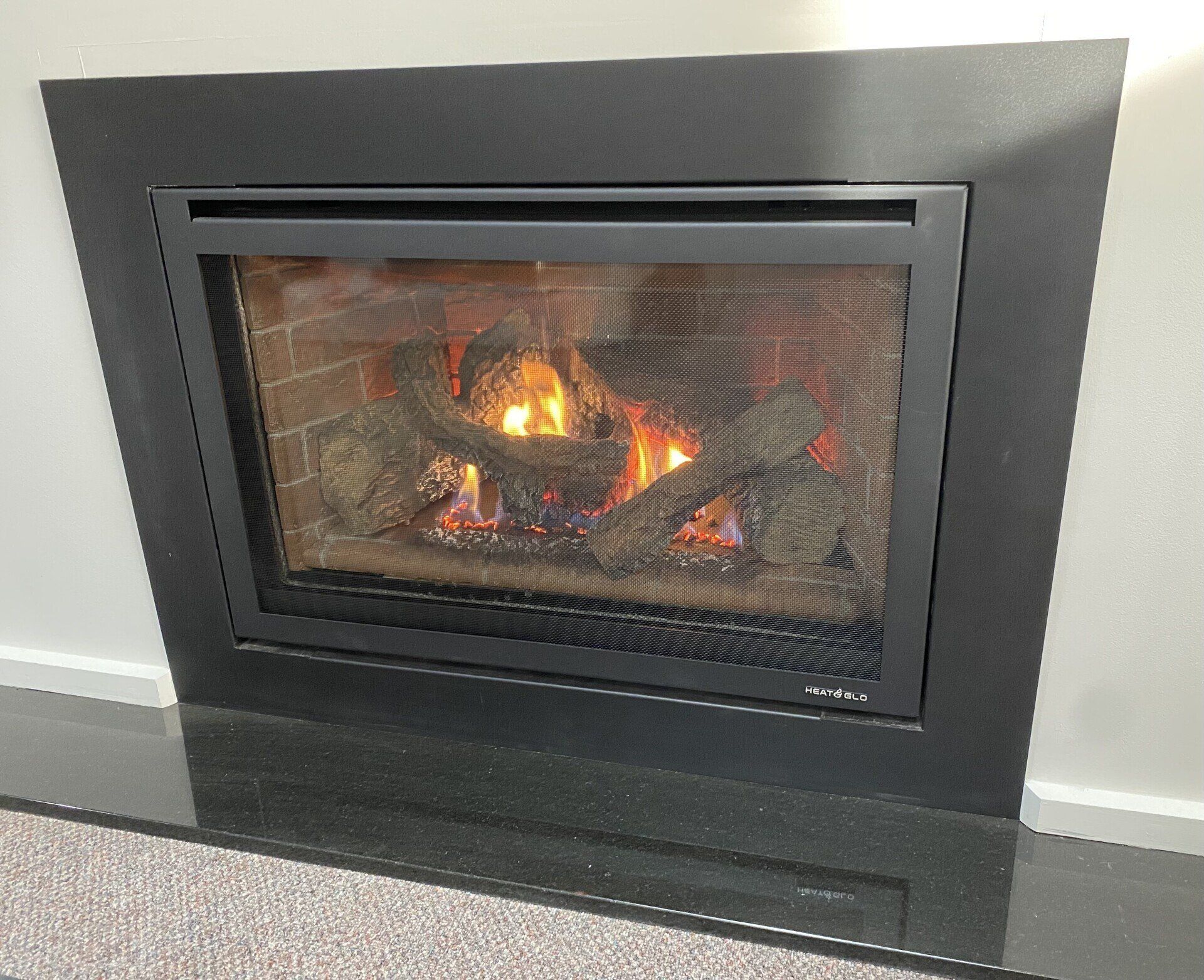 close up of fireplace installed into wall by dwr services 