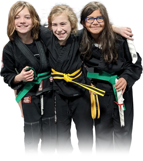 three young girls wearing black karate uniforms and green belts are posing for a picture .