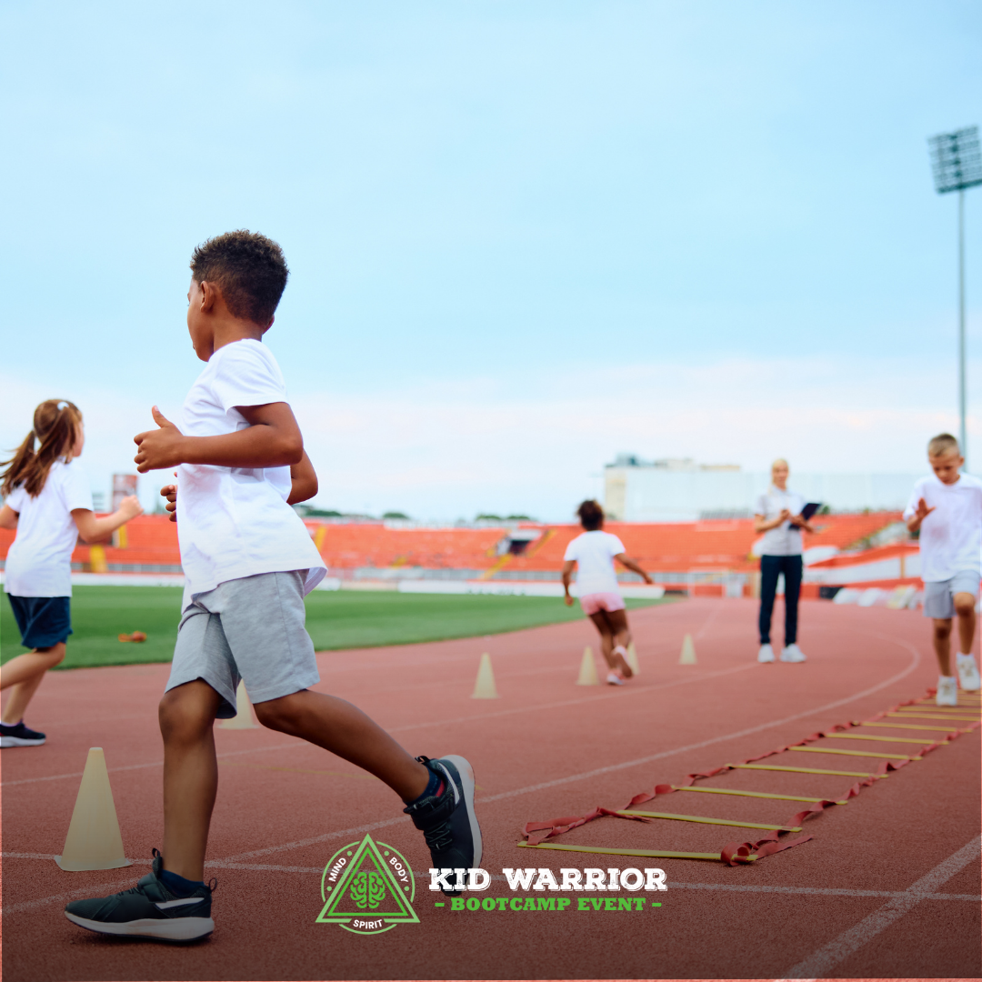 A group of kids are running on a track sponsored by kid warrior