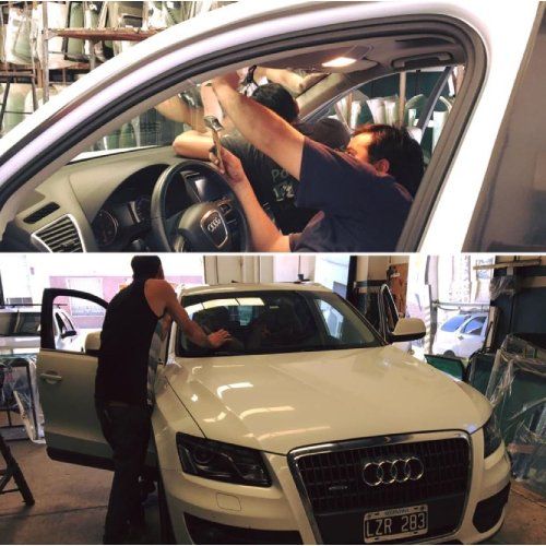 hombres trabajando en un auto