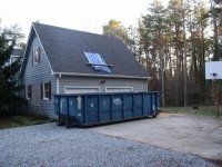 Navy House With Trees — Greensboro, NC — CNE Home Improvement