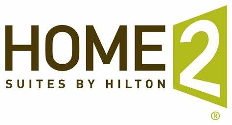 The logo for home 2 suites by hilton is green and brown.