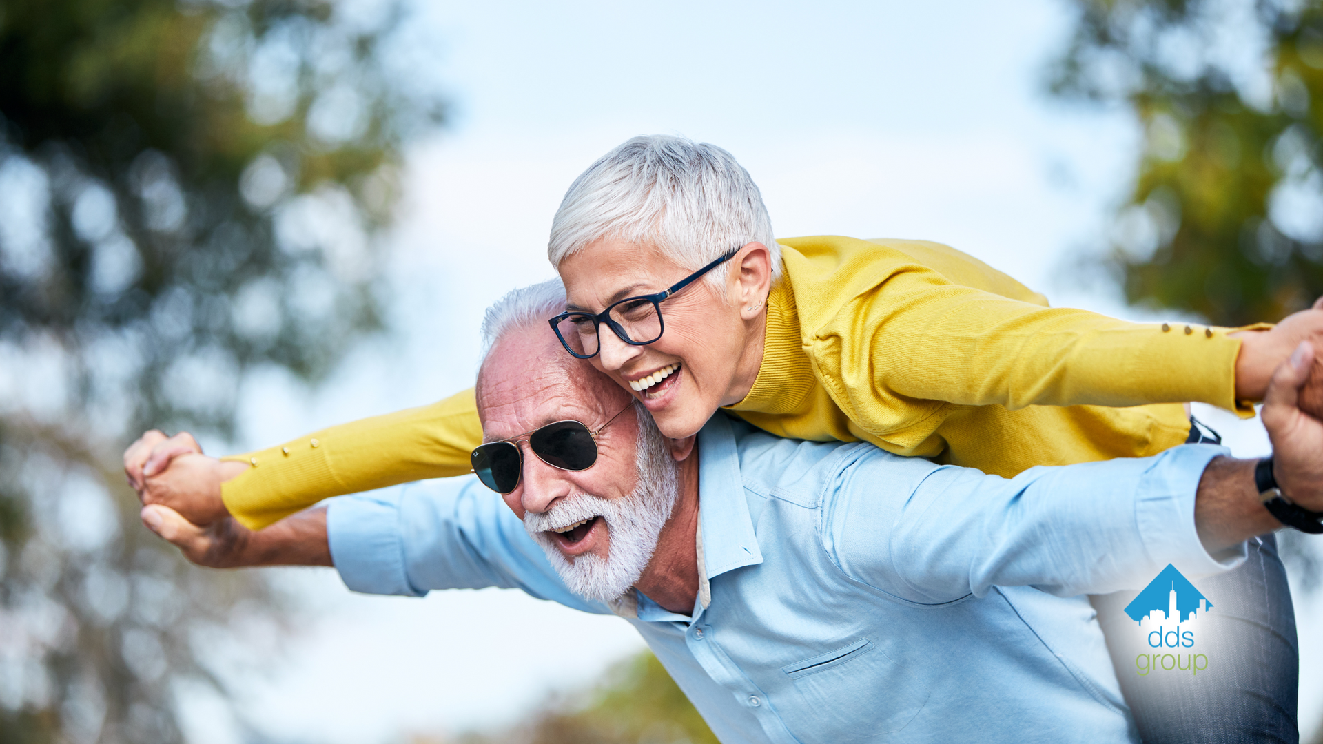 A man is carrying a woman on his back.