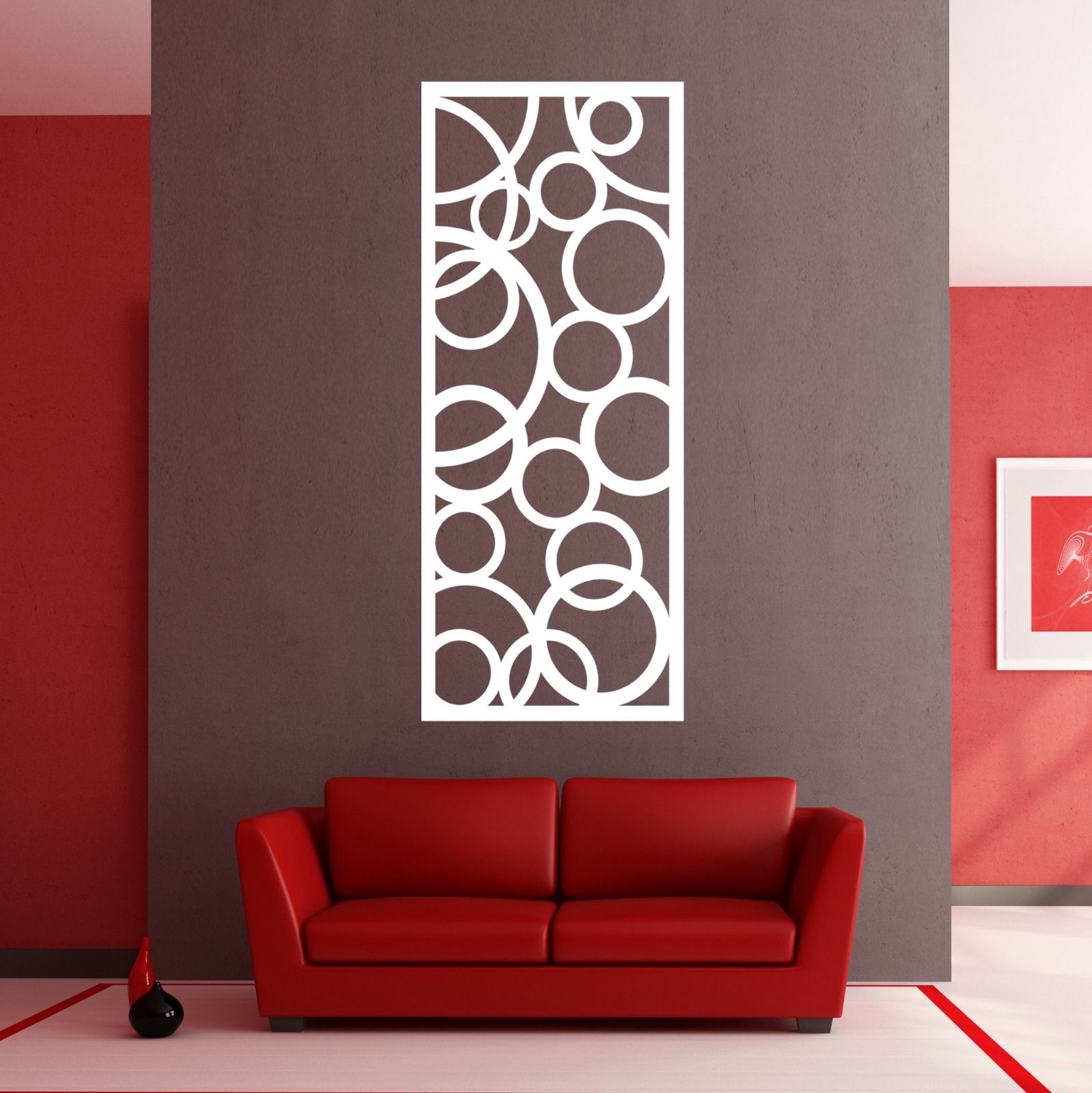 A living room with red walls and a red couch — Keystone Engineering Sheet Metal Industries in Noosaville, QLD