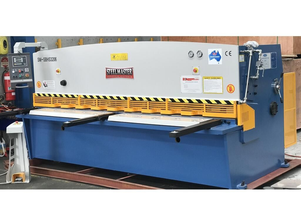 A blue and white machine is sitting on a table in a factory. — Keystone Engineering Sheet Metal Industries in Noosaville, QLD