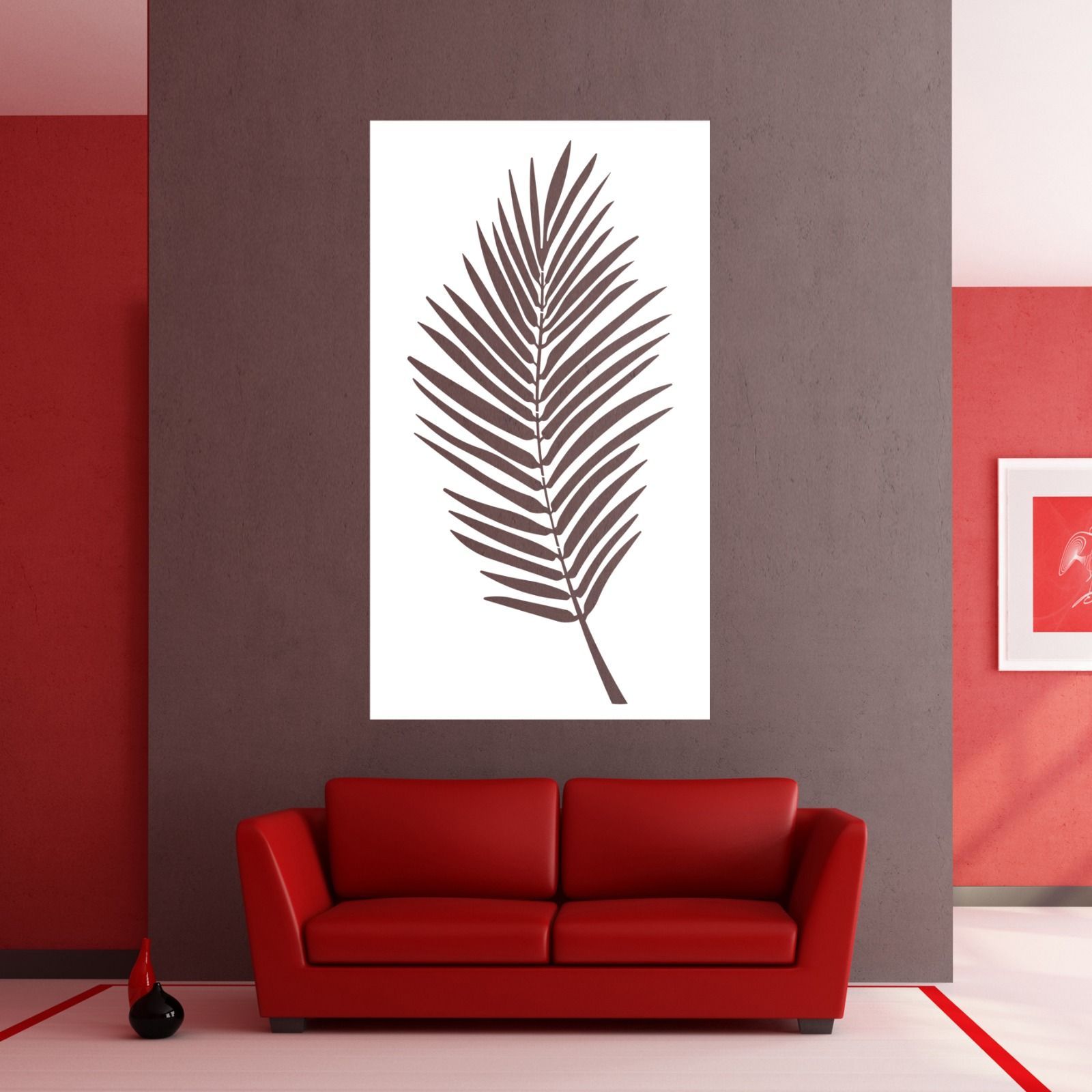 A living room with a red couch and a picture of a palm leaf on the wall — Keystone Engineering Sheet Metal Industries in Noosaville, QLD