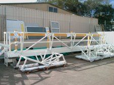 A large metal structure is sitting in front of a building. — Keystone Engineering Sheet Metal Industries in Noosaville, QLD