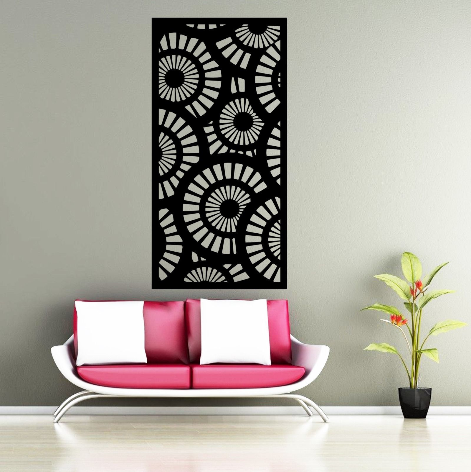 A living room with a pink couch and a plant — Keystone Engineering Sheet Metal Industries in Noosaville, QLD