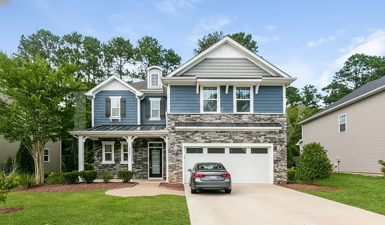 Brick building with large windows showing a well-lit living room, two figures looking out at a city street.