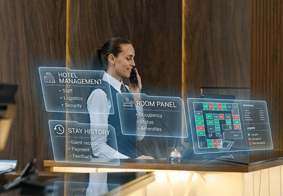 hotel The receptionist is taking calls using deskphone
