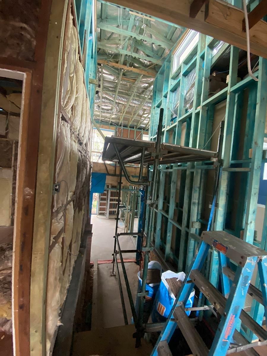 A Building Under Construction With Scaffolding And Stairs — B Smart Building & Design In Wollongong, NSW