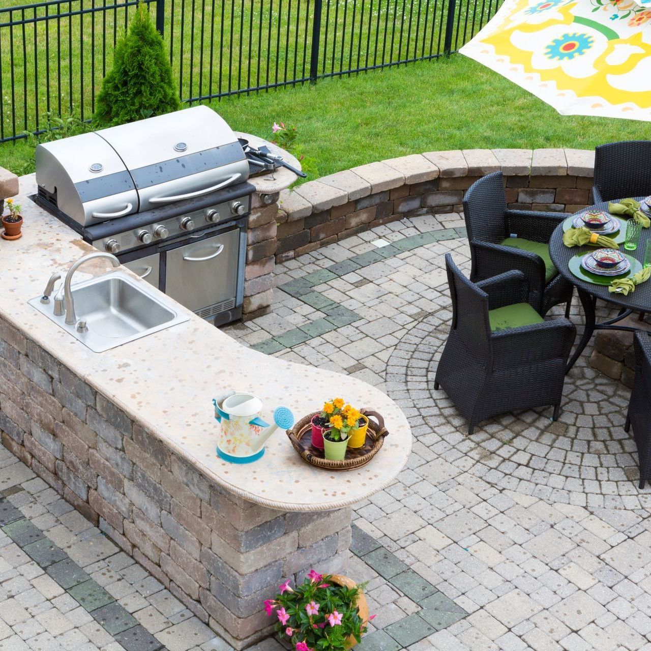 paved patio with grill