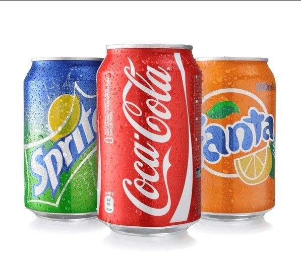 Three Cans of Soda, Sprite, Coca Cola and Fanta, on a White Background — Central Coast Storage Solutions in Toormina, NSW