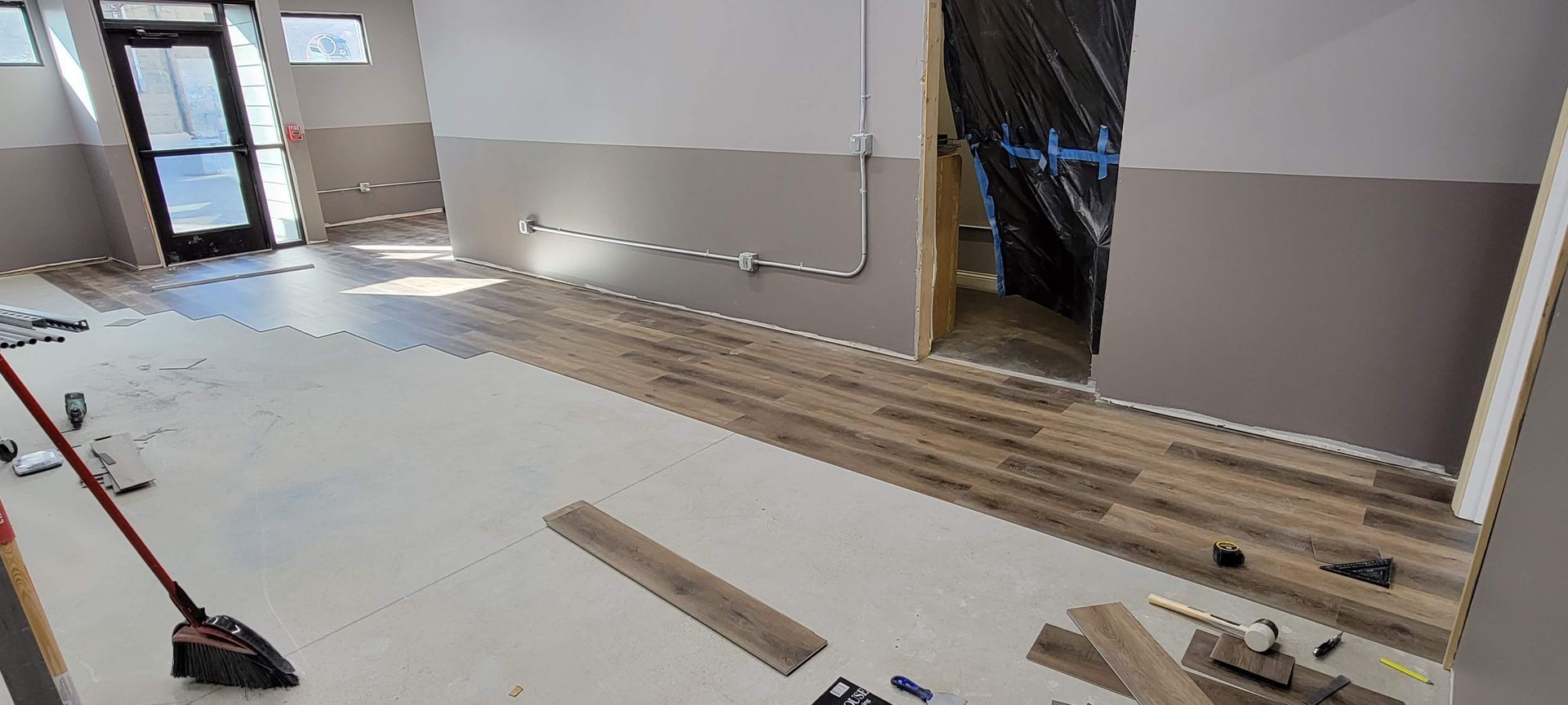 Light wood floor with pale beige planks and visible grain patterns