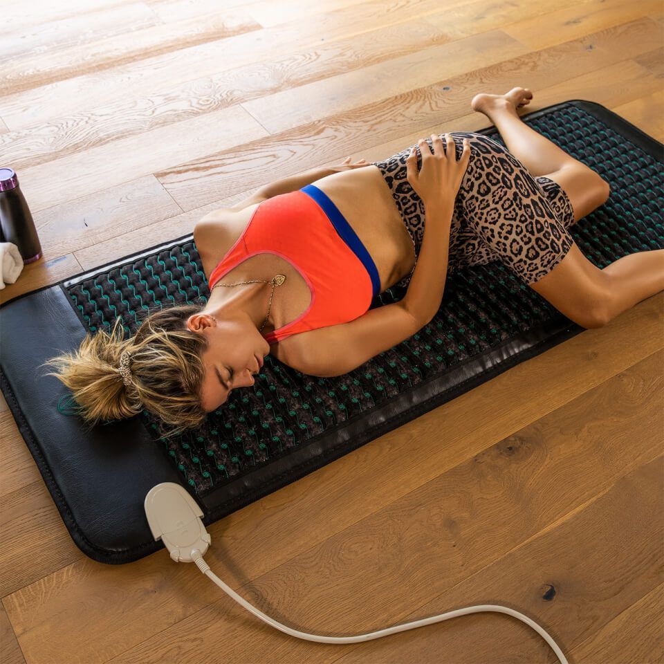 Woman on PEMF Mat