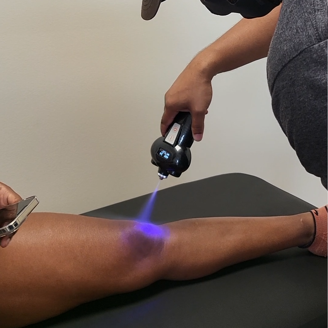 A woman standing still in front of the 3D cameras of KinetiSense during a balance screening. This technology aids in creating a Tailored Treatment plan by identifying specific balance issues and symptoms, which accelerates recovery and reduces the risk of long-term complications.