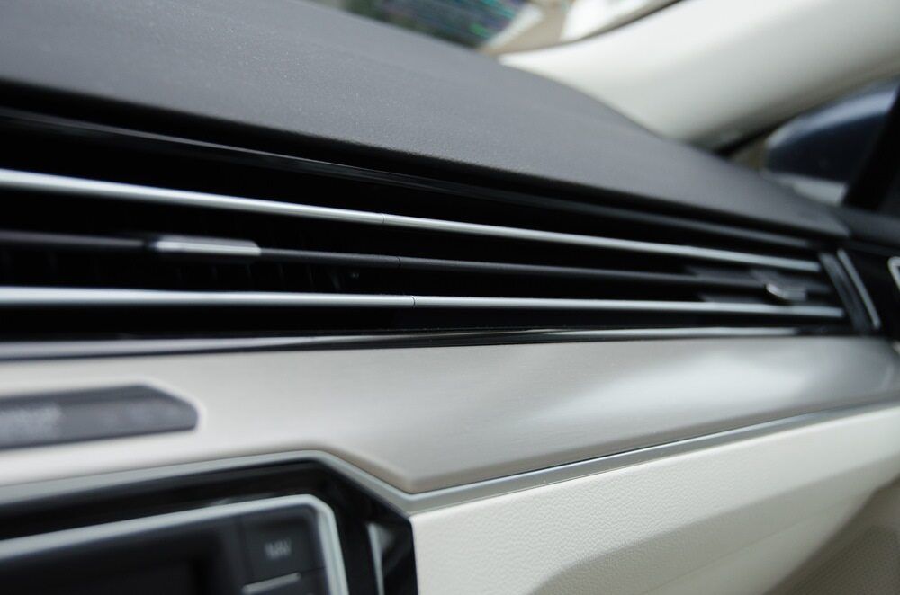 Car Dashboard Interior With Air Vents and Silver Trim — Resurge Diesel & Fabrication Pty Ltd In Balnagowan, QLD