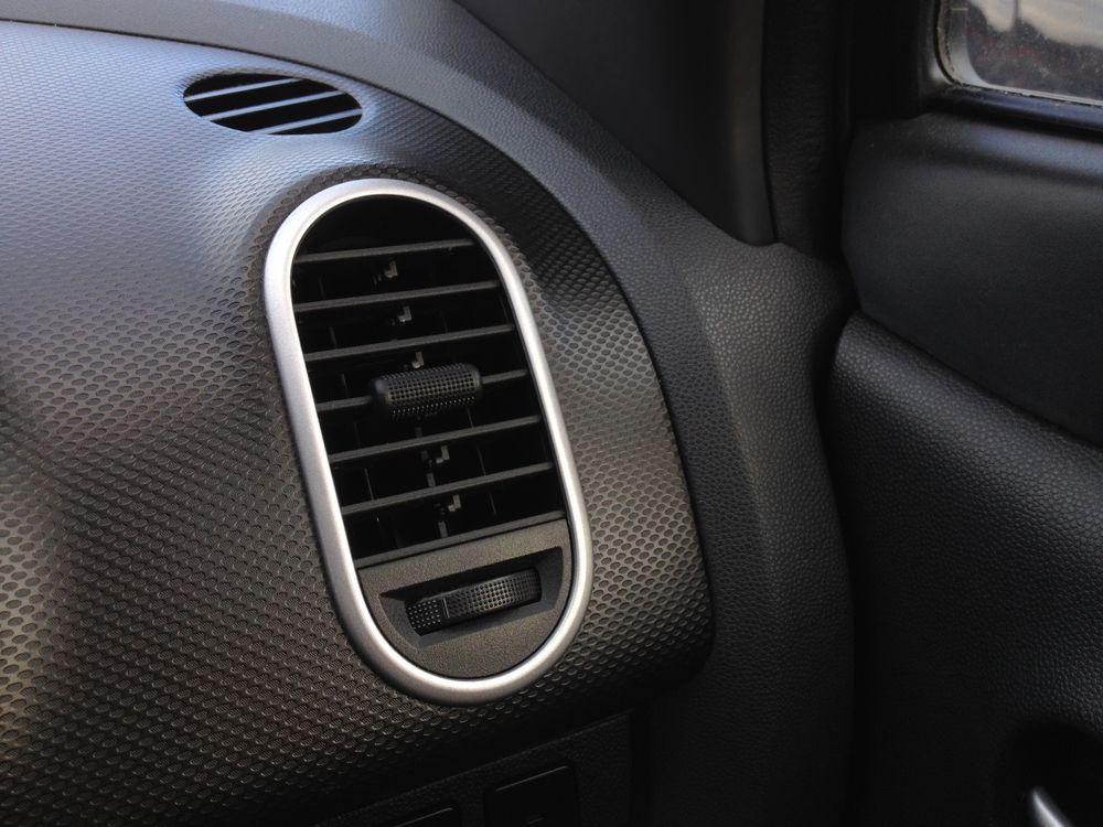 Car Dashboard Air Vent With Silver Trim and Textured Black Paneling — Resurge Diesel & Fabrication Pty Ltd In Balnagowan, QLD