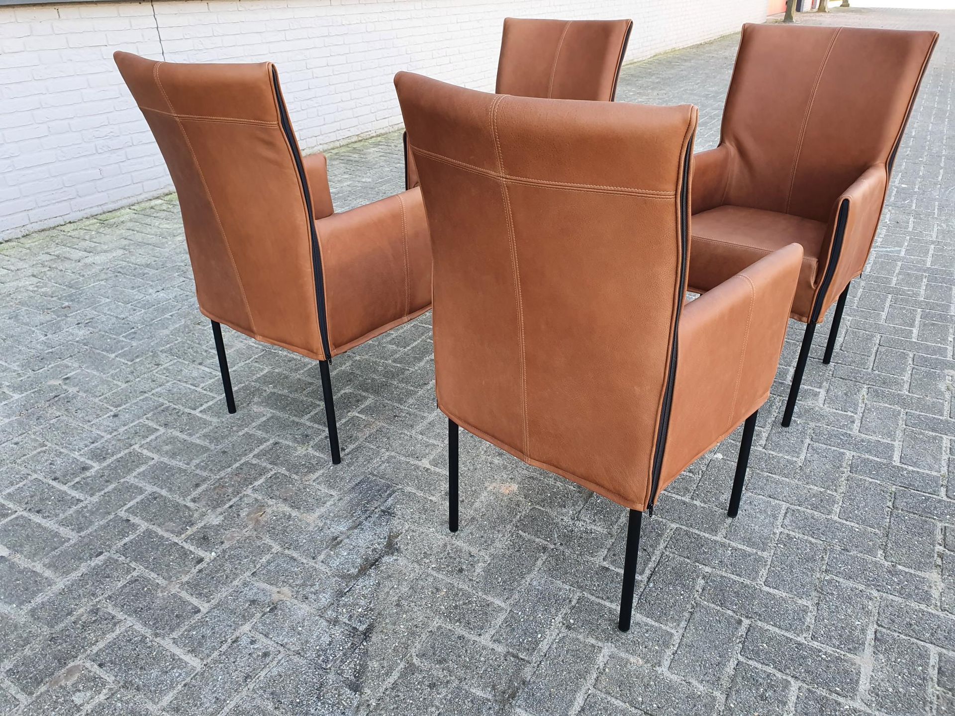 Basty Armstoel Design In Cognac Rancho leder 4 stuks Showroom aanbieding