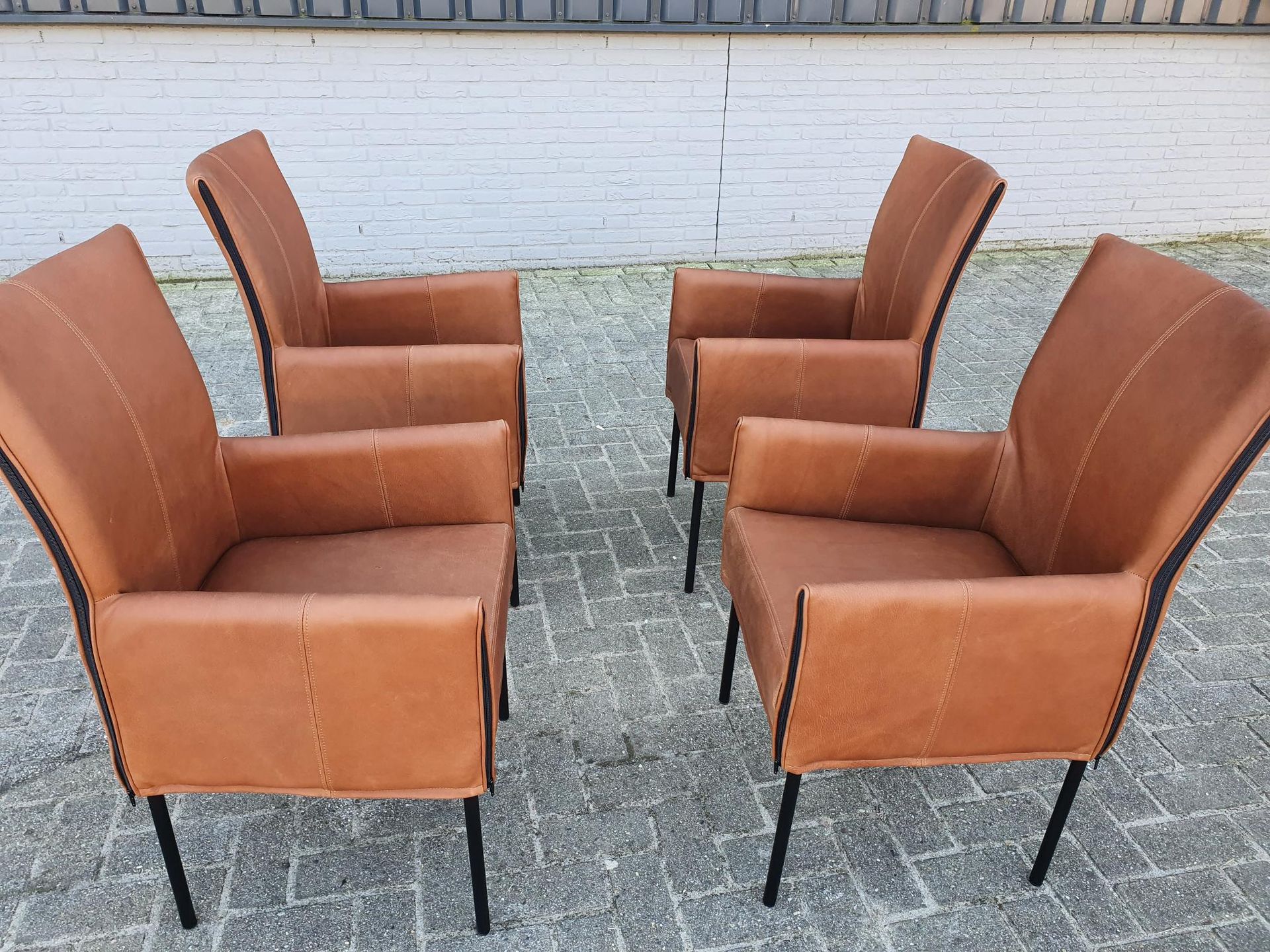 Basty Armstoel Design In Cognac Rancho leder 4 stuks Showroom aanbieding