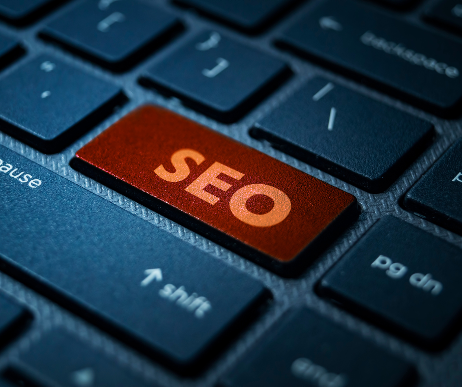 Close-up of a computer keyboard with a red key labeled SEO, symbolizing search engine optimization.