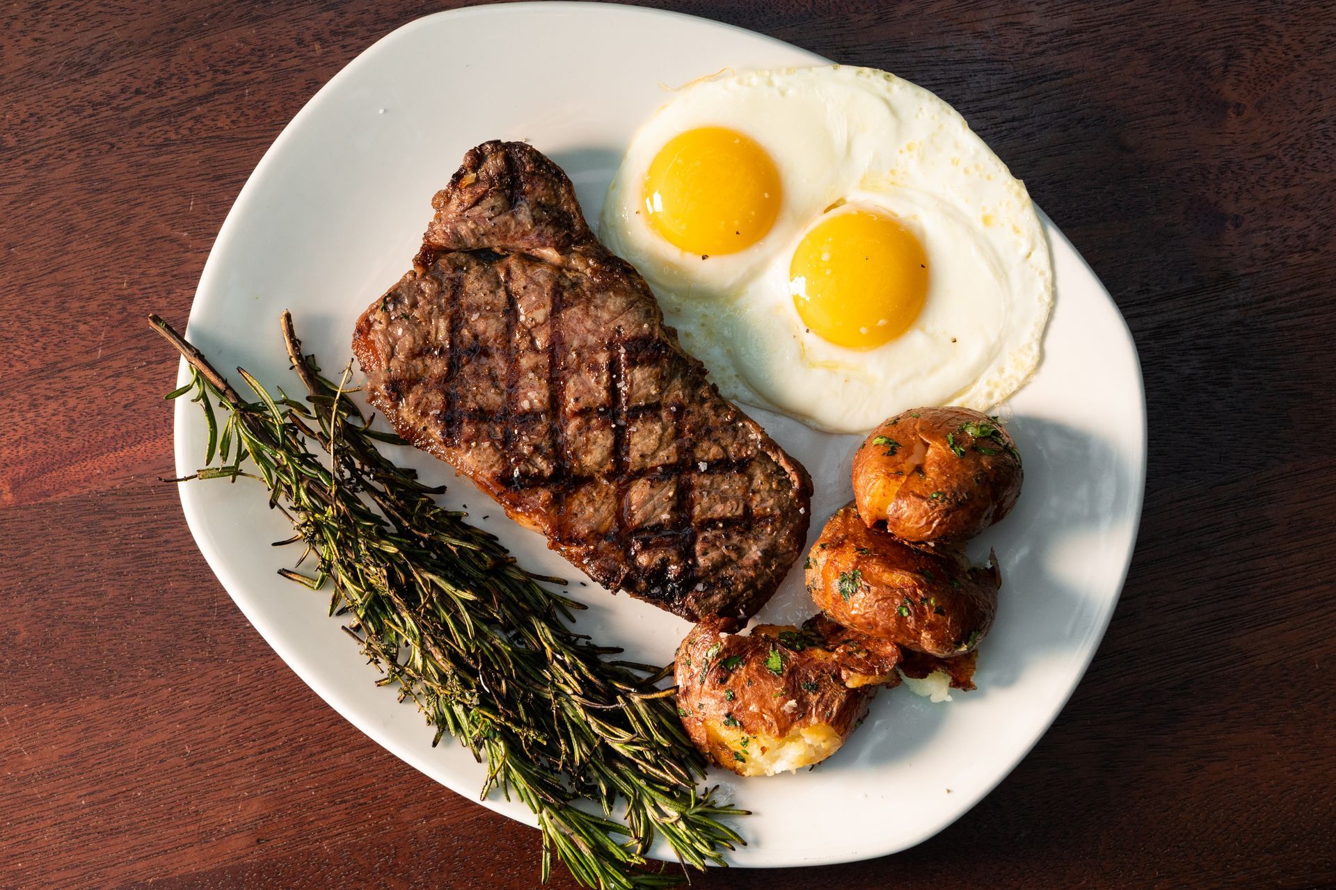 A picture of steak and eggs