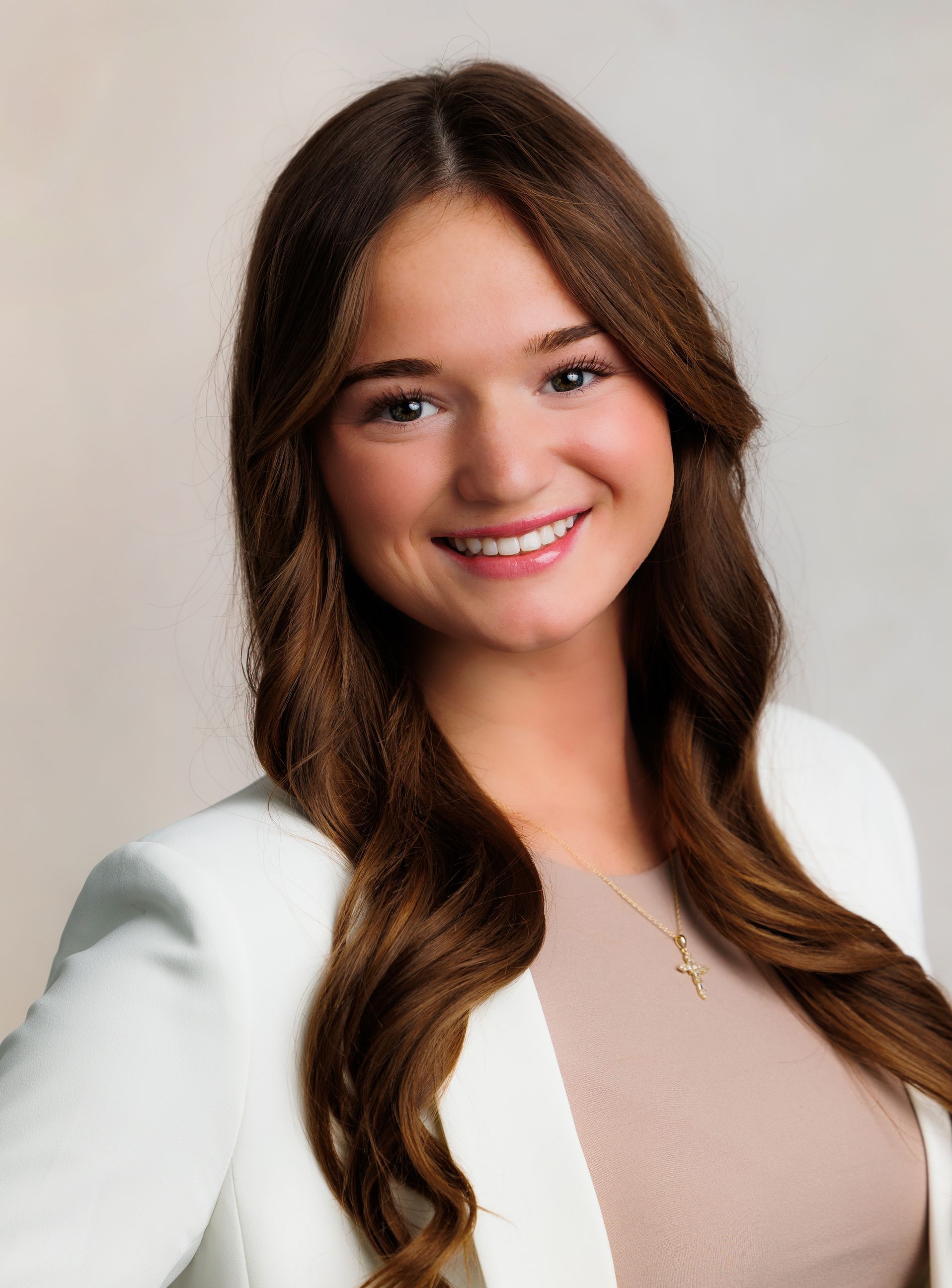 Ashlyn Ross posing for a picture and smiling for the camera