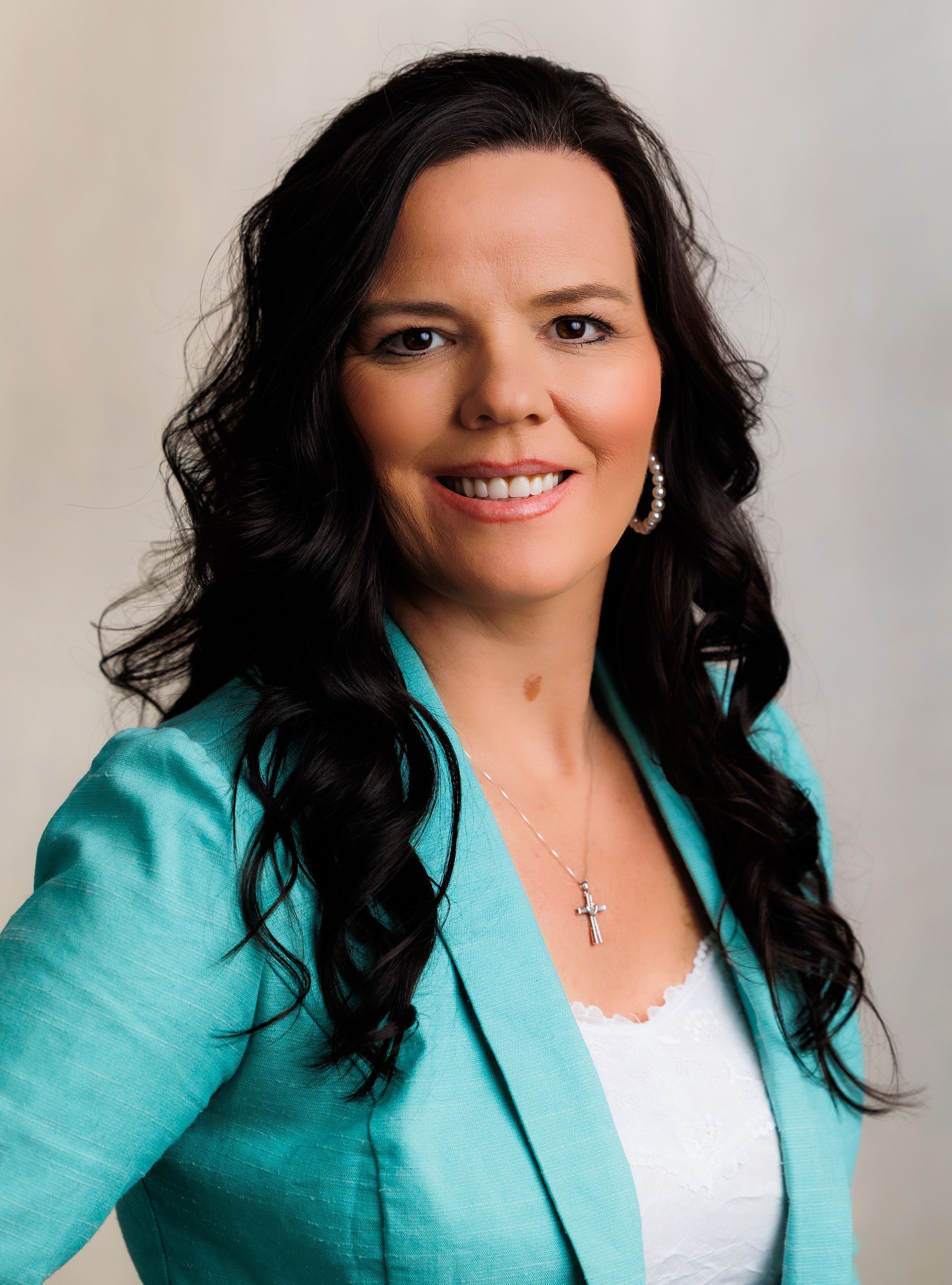 Sheena Ross posing for a picture and smiling for the camera