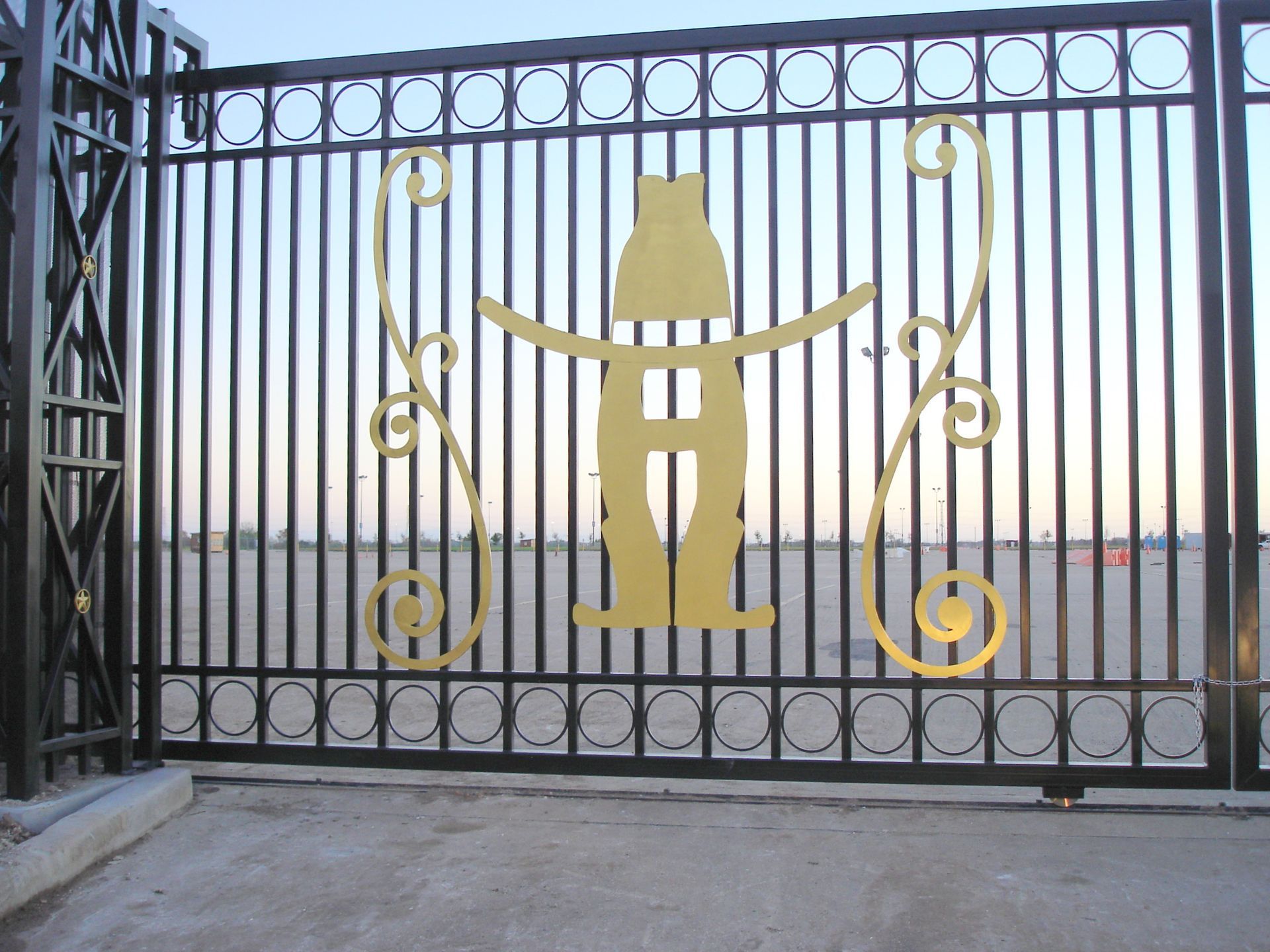A fence with a picture of a man in a cowboy hat on it